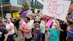 In this Oct. 2, 2021 photo people participate in the Houston Women’s March against Texas abortion ban. (Melissa Phillip/Houston Chronicle)