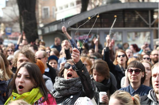 Choices without Borders. Women hold up wire coat hangers as part of massive demonstrations in Poland, protesting abortion ban by Polish government. Photo: NURPHOTO/ZUMA PRESS. Letter of support from American Feminists published in Poland’s largest daily news outlet, GAZETA WYBORCZA was shared widely.